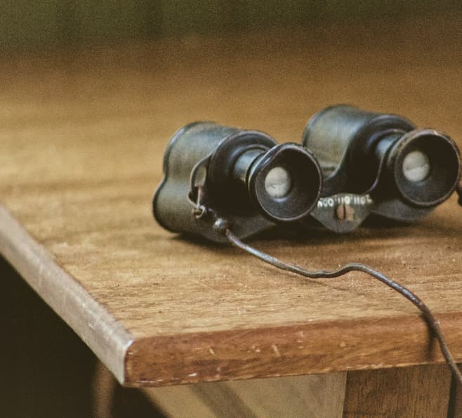 Binoculars on a desk