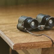 Binoculars on a desk