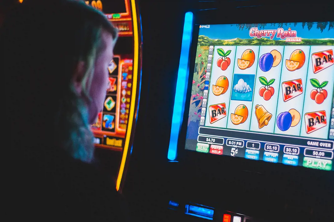 person-playing-slot-game