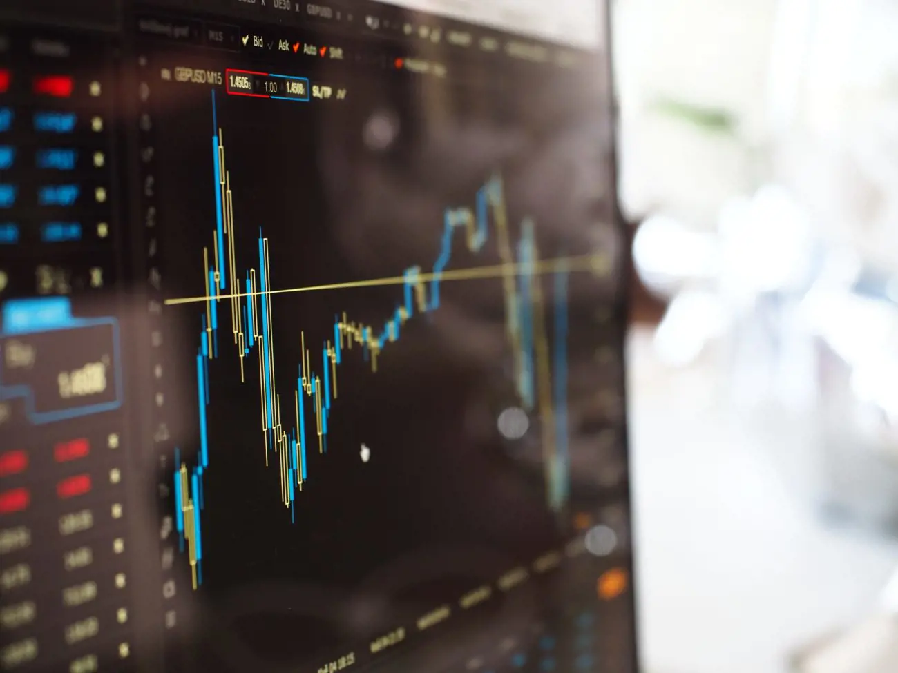 blue-and-yellow-graph-on-stock-market-monitor-159888